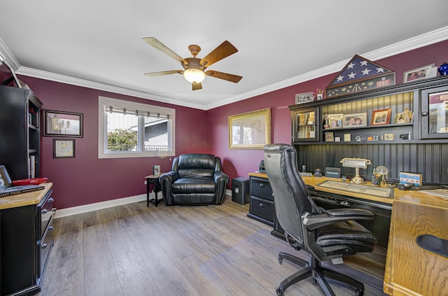 office area with hardwood / wood-style floors, ceiling fan, and ornamental molding