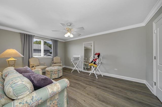 living room with crown molding, dark hardwood / wood-style flooring, and ceiling fan