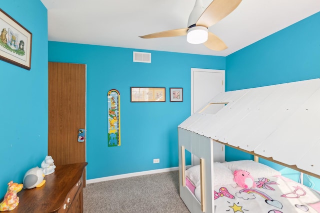 bedroom with dark carpet and ceiling fan