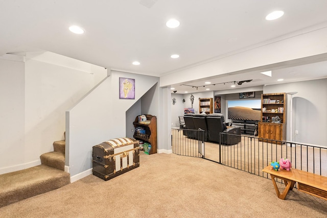 recreation room with carpet flooring