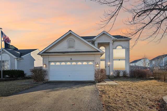 view of front of property featuring a garage