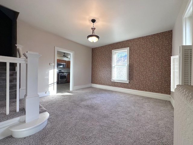 unfurnished living room with carpet floors