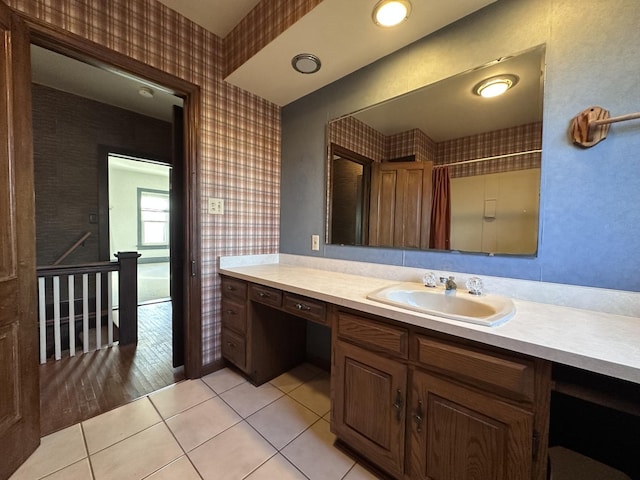 bathroom featuring tile patterned floors and vanity