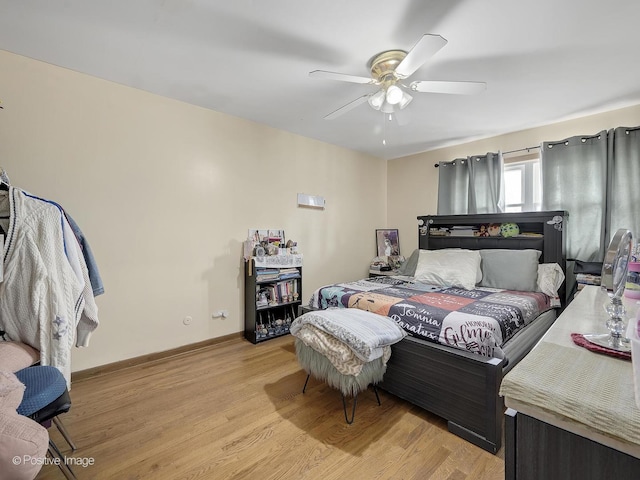 bedroom featuring ceiling fan and light hardwood / wood-style flooring