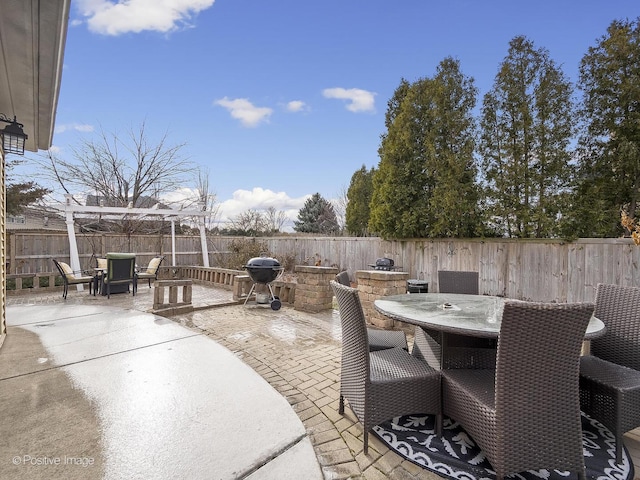 view of patio / terrace featuring a pergola and grilling area