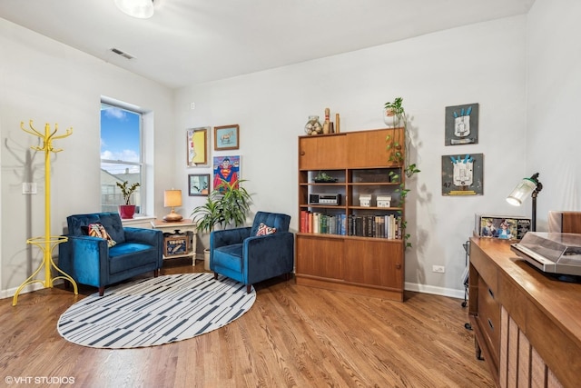 living area featuring light hardwood / wood-style floors