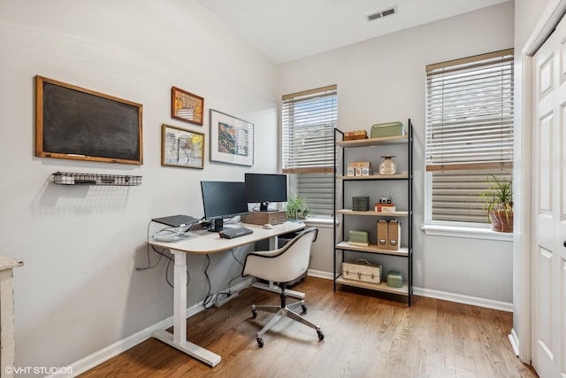 home office featuring hardwood / wood-style flooring