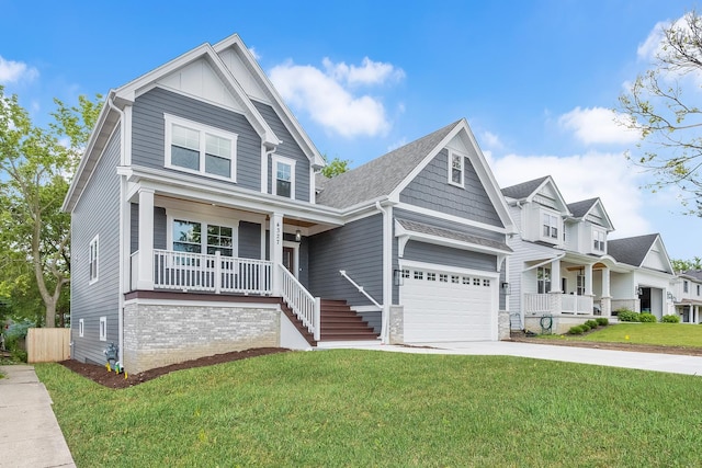 craftsman house with a porch and a front yard