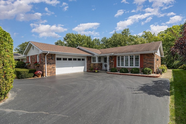 ranch-style home with a garage