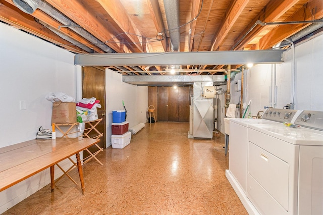 basement featuring washing machine and dryer