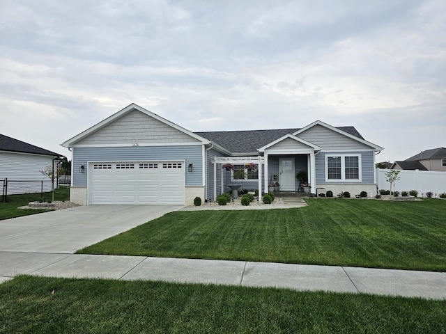 single story home with a front yard and a garage