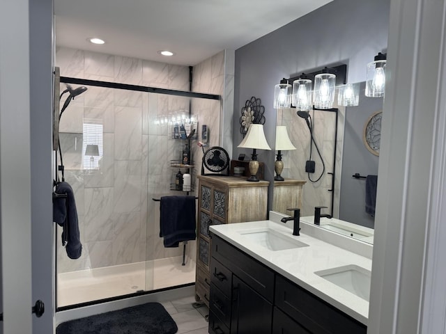 bathroom featuring vanity and an enclosed shower