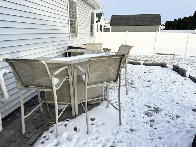 view of snow covered patio