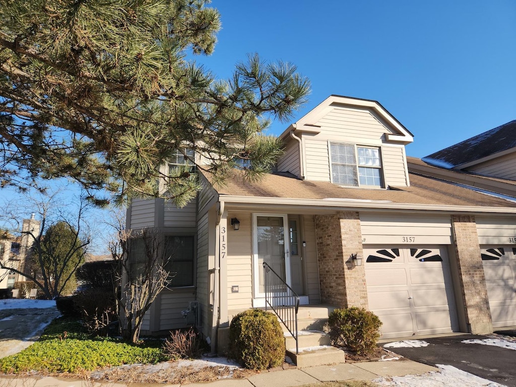 view of front of home with a garage