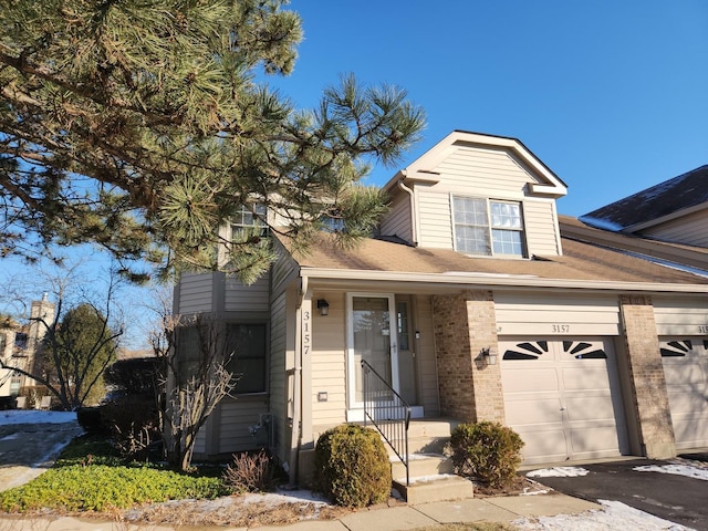 view of front of home with a garage