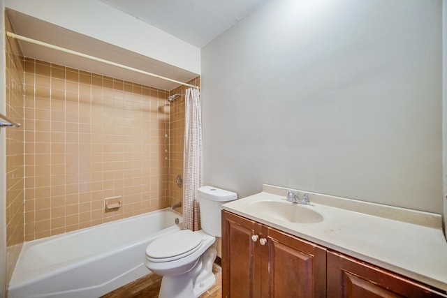 full bathroom featuring toilet, vanity, and shower / tub combo with curtain