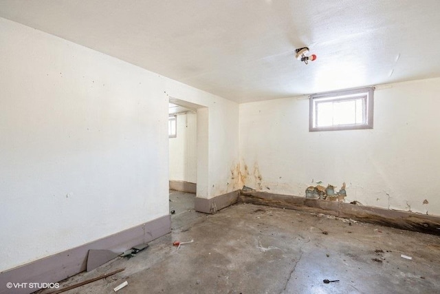 empty room featuring concrete flooring