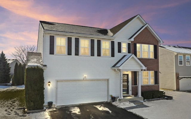 view of front of home featuring a garage