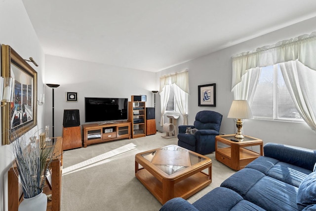 living room with light carpet and a wealth of natural light