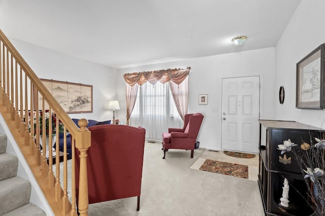 living room featuring light colored carpet