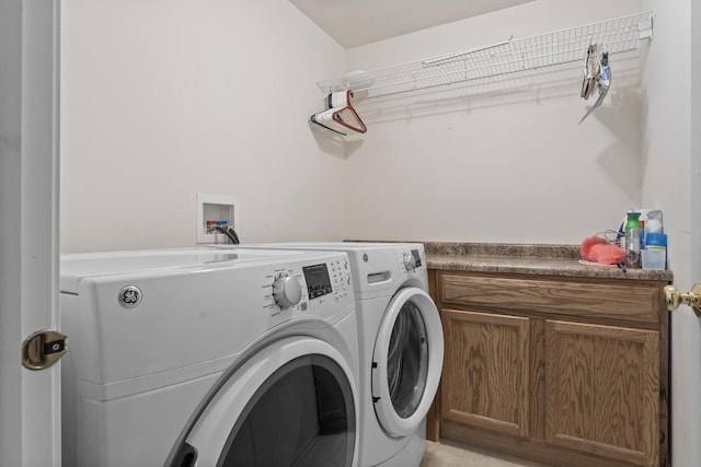 washroom with washing machine and dryer