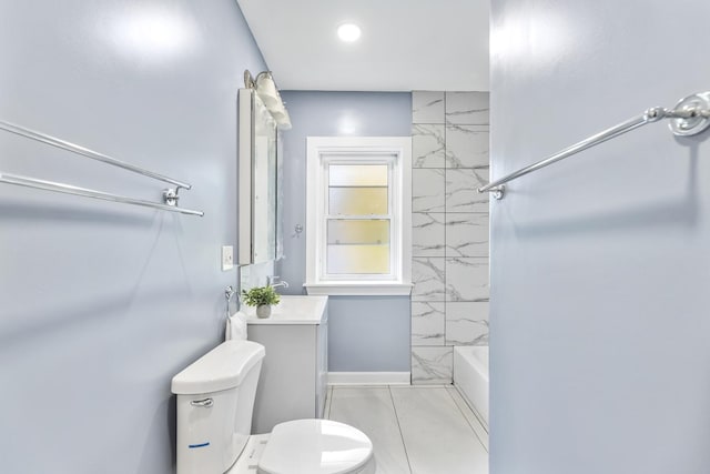 full bathroom featuring vanity, tiled shower / bath combo, and toilet