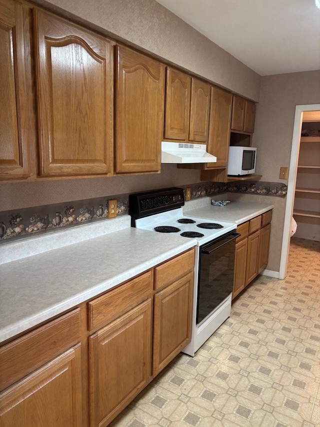 kitchen with electric range oven