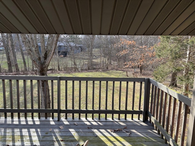 wooden terrace with a yard