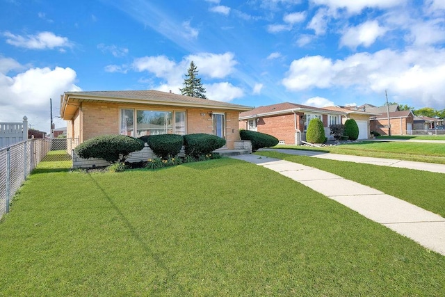 single story home with a front lawn