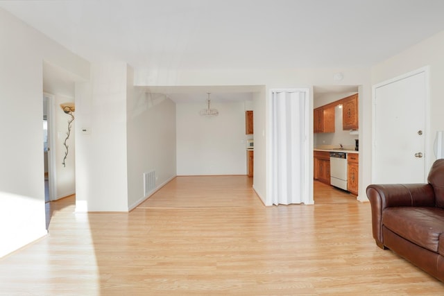 living room with light hardwood / wood-style floors