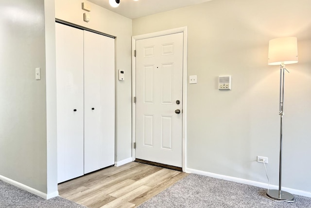 entrance foyer with light hardwood / wood-style flooring