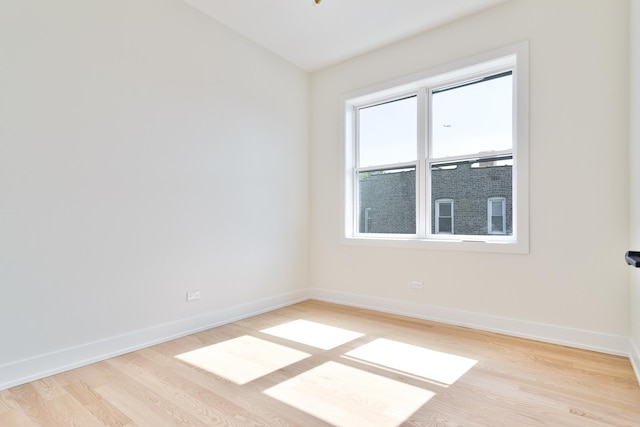 unfurnished room featuring light wood-type flooring