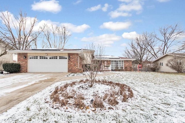 single story home with a garage