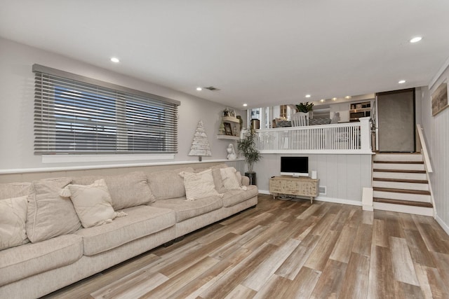 unfurnished living room with light hardwood / wood-style flooring