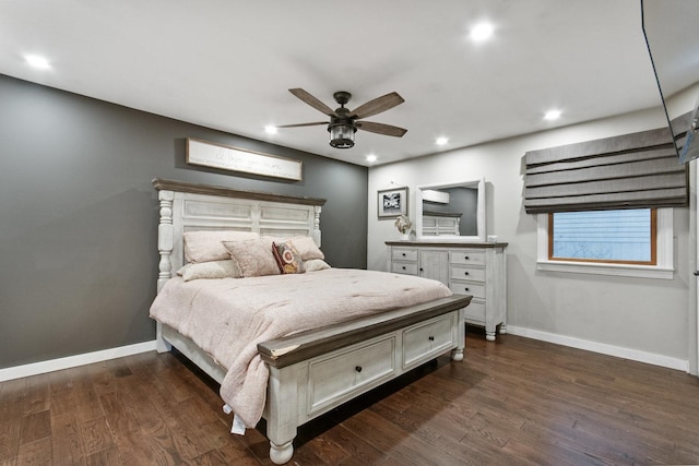 bedroom with ceiling fan and dark hardwood / wood-style floors