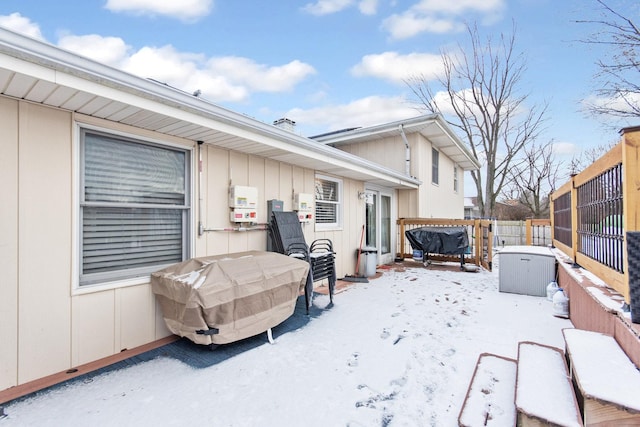 view of snow covered patio