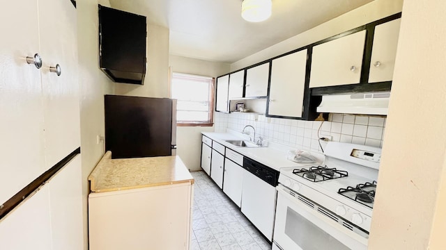 kitchen featuring white cabinetry, white appliances, sink, and backsplash