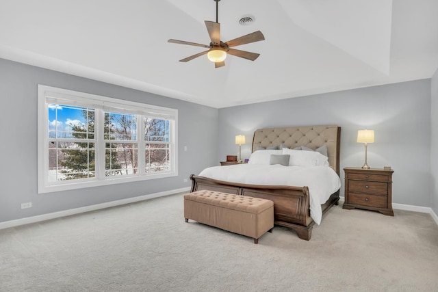 bedroom featuring ceiling fan and light carpet