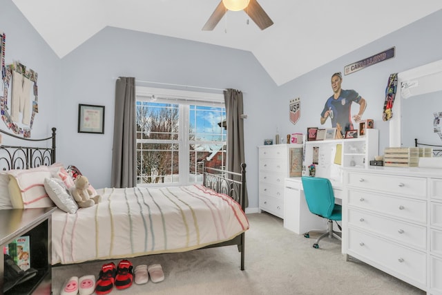 bedroom featuring ceiling fan, light colored carpet, and vaulted ceiling