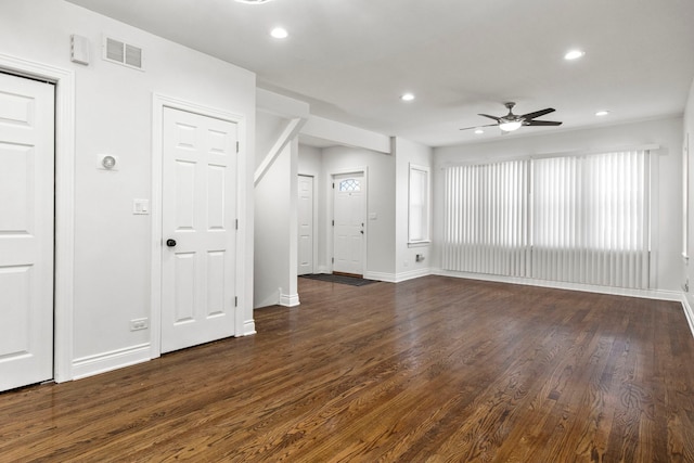 unfurnished living room featuring visible vents, a ceiling fan, dark wood-style floors, recessed lighting, and baseboards