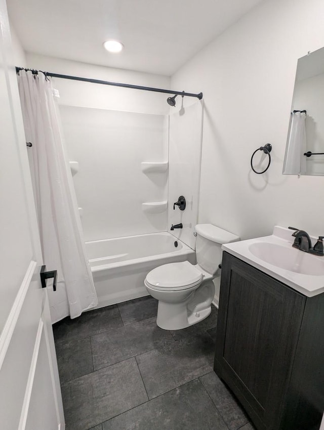 full bathroom featuring vanity, toilet, and shower / tub combo