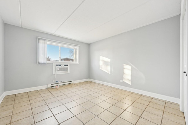 tiled empty room featuring a wall mounted air conditioner and a baseboard heating unit