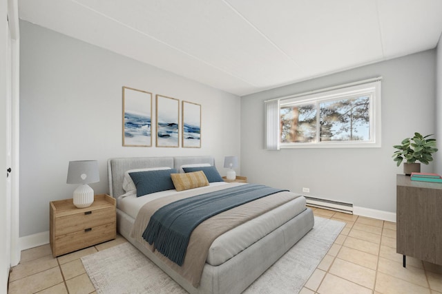 bedroom with light tile patterned floors and a baseboard radiator