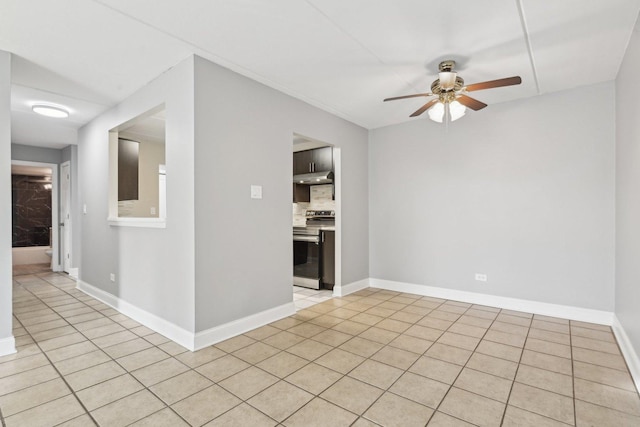 unfurnished room with light tile patterned floors and ceiling fan