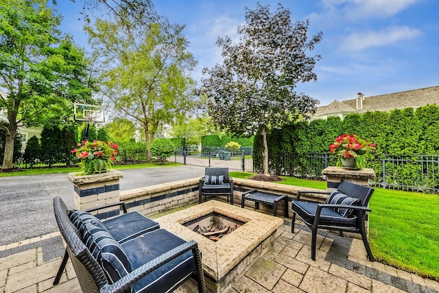 view of patio featuring a fire pit