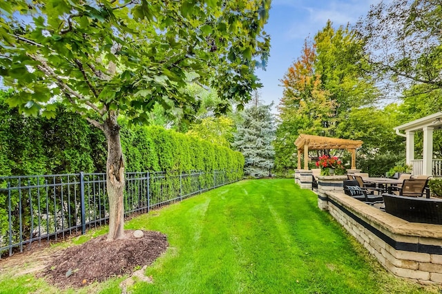 view of yard with a pergola and a patio