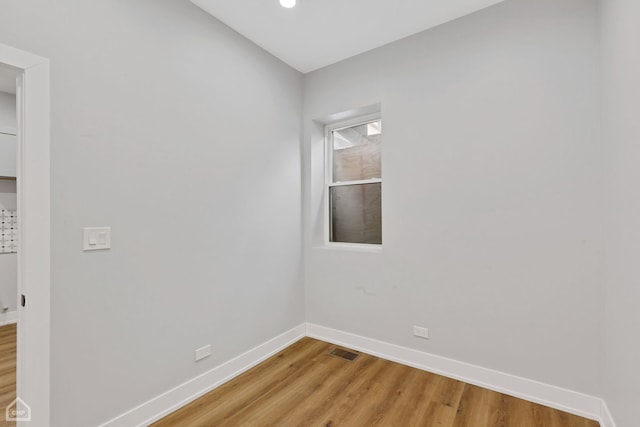 unfurnished room featuring light hardwood / wood-style flooring