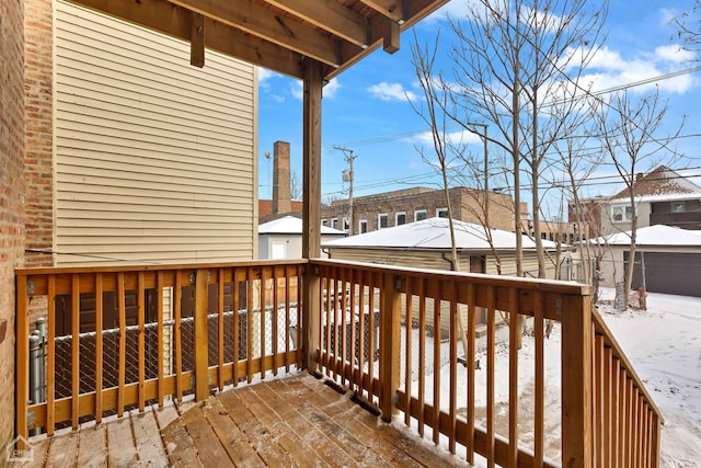 view of snow covered deck