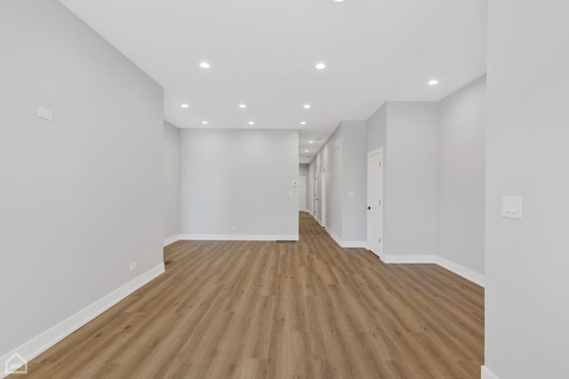 spare room with light hardwood / wood-style flooring