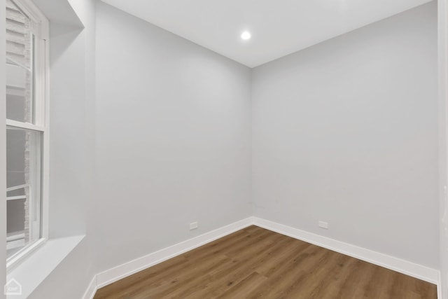 empty room featuring hardwood / wood-style flooring